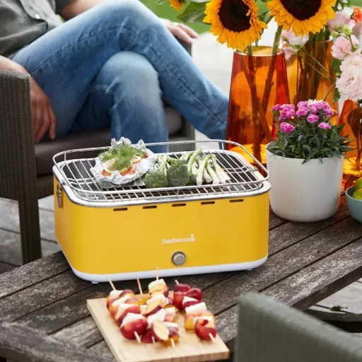 Barbecook BC-CHA-1016 Carlo asztali faszenes grill, sárga