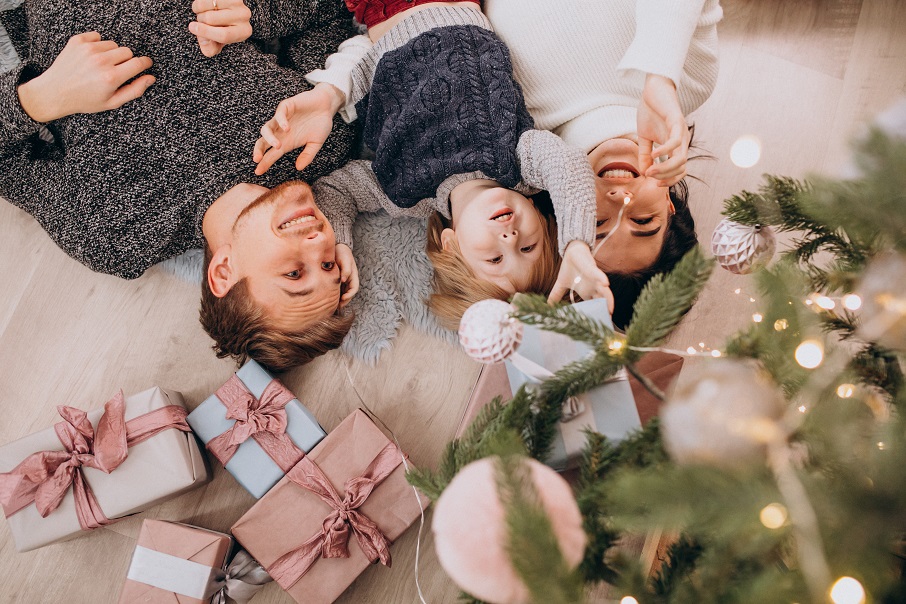 young-family-with-little-son-christmas-tree