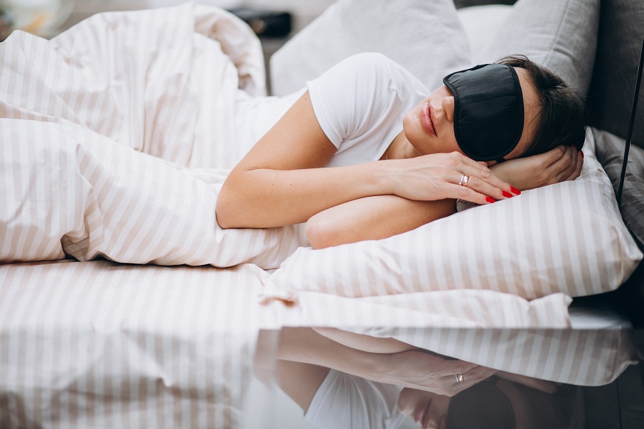 young-woman-resting-bed-morning
